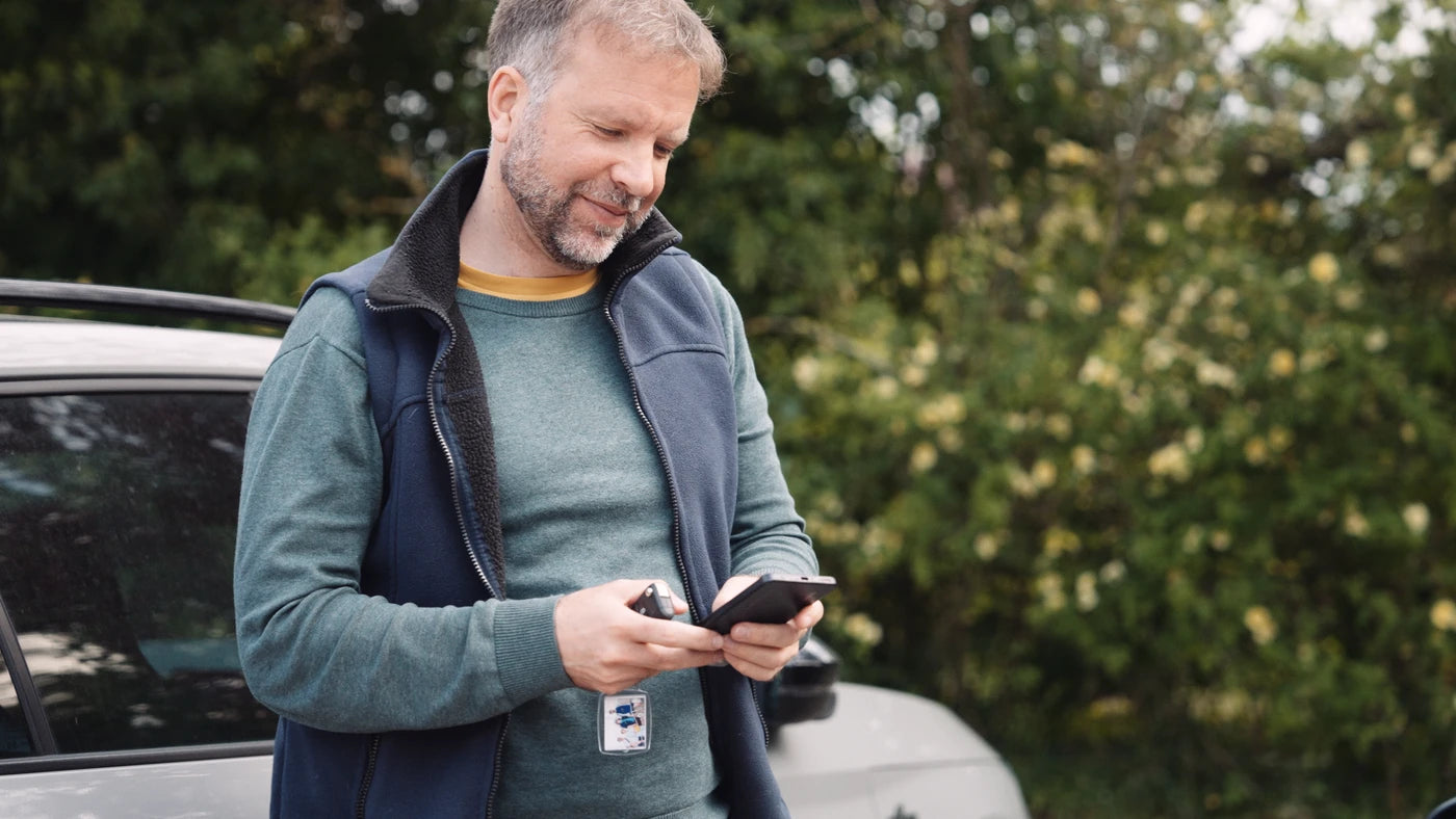 Man using his phone outdoors